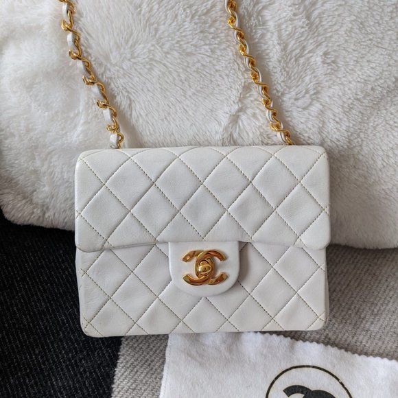 CHANEL Handbags - Chanel classic mini flap bag white and gold